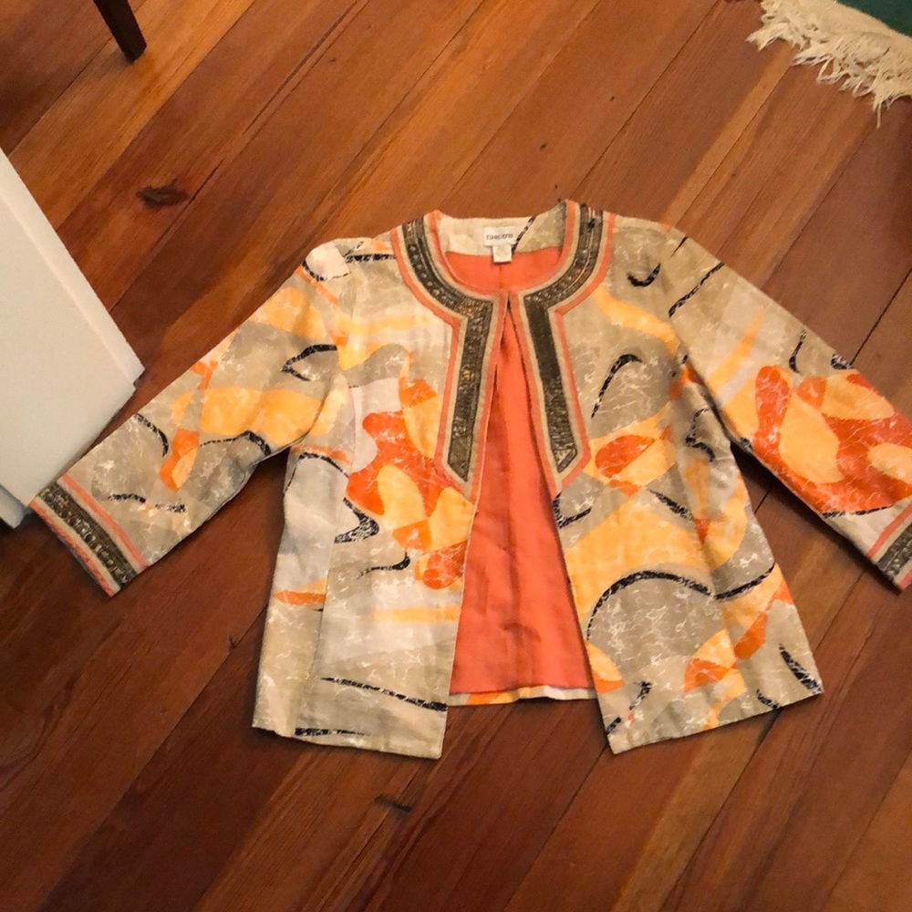 Chico’s woman’s jacket. Beautifully lined . Mint condition. Free matched Tee